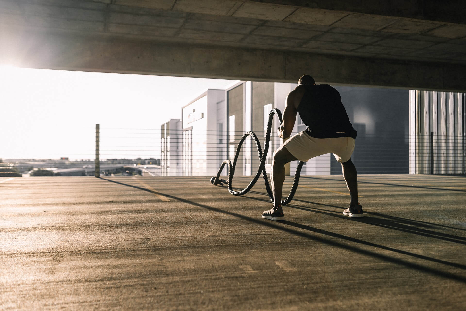 A man working out and sweating... a lot.